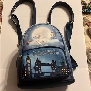 Loungefly Peter Pan Themed Blue Backpack. Great pre-loved condition.